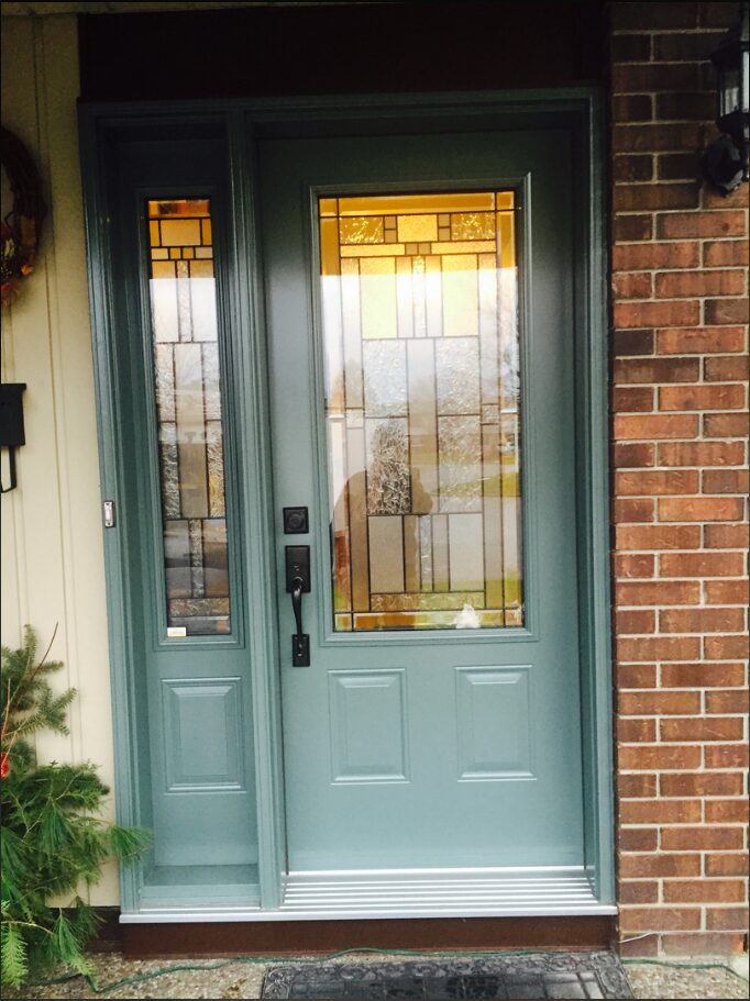 A grayish blue entry door